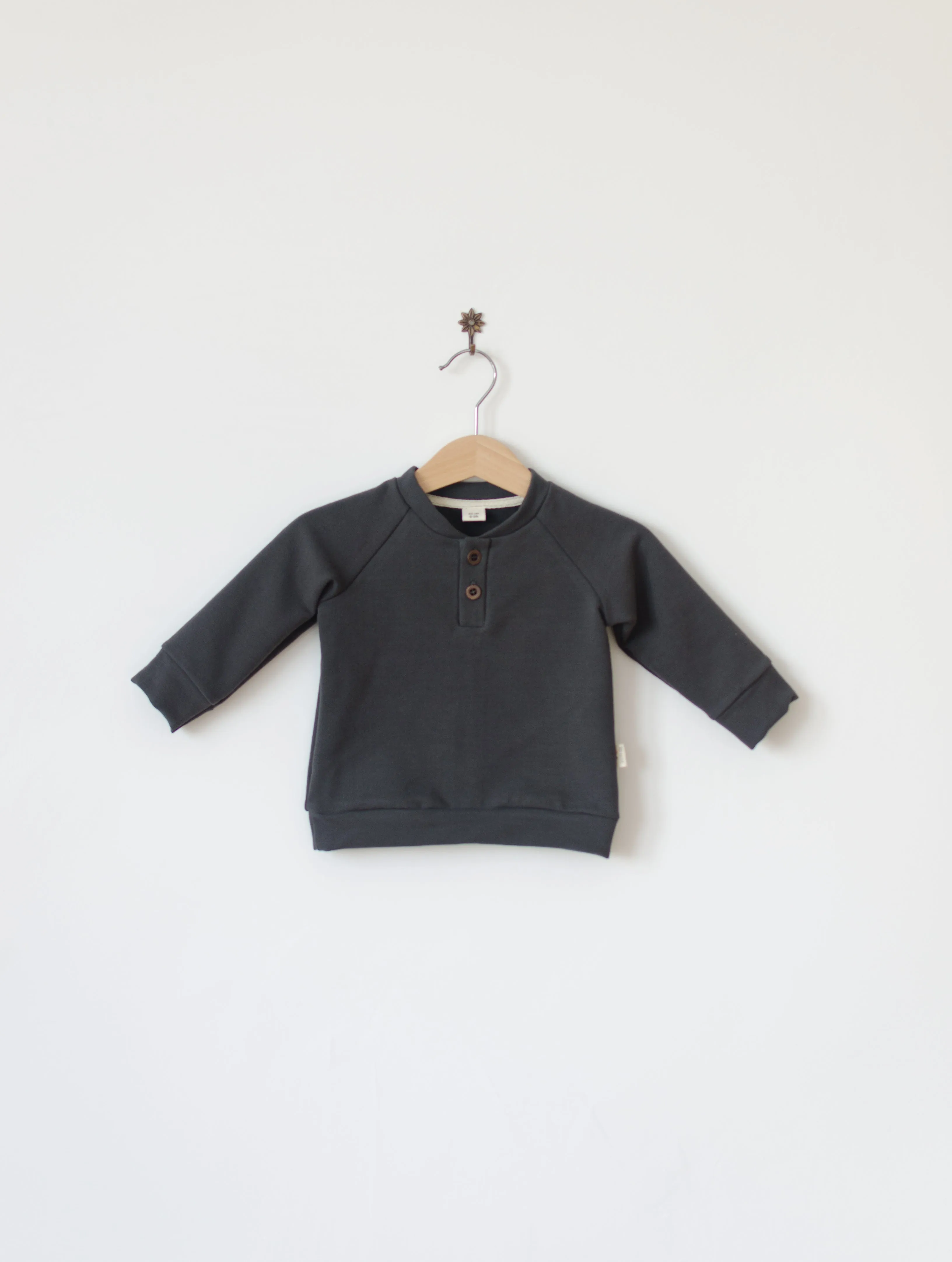 Placket neck sweater