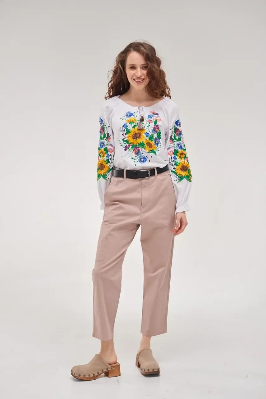 Women's embroidered blouse with a floral embroidery design