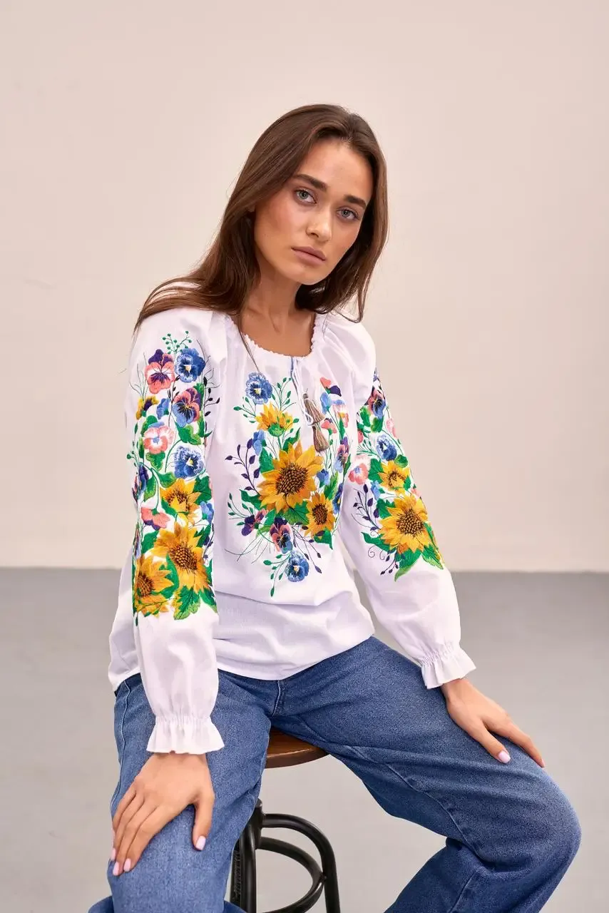 Women's embroidered blouse with a floral embroidery design